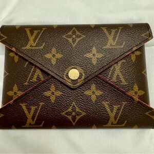 LV passport wallet, used once for my passport.
